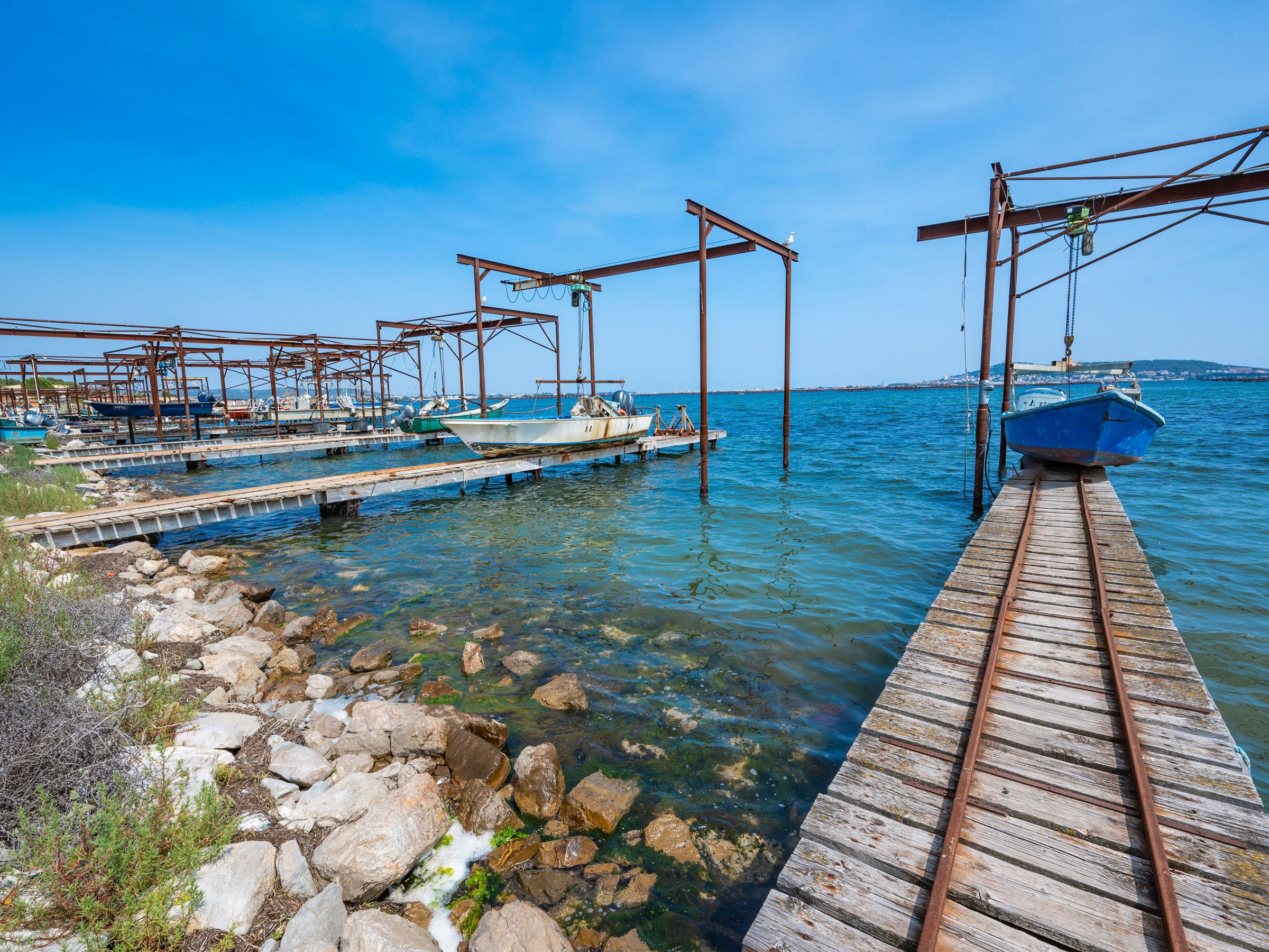The oyster tables of the Étang de Thau and their wooden walkway above the water